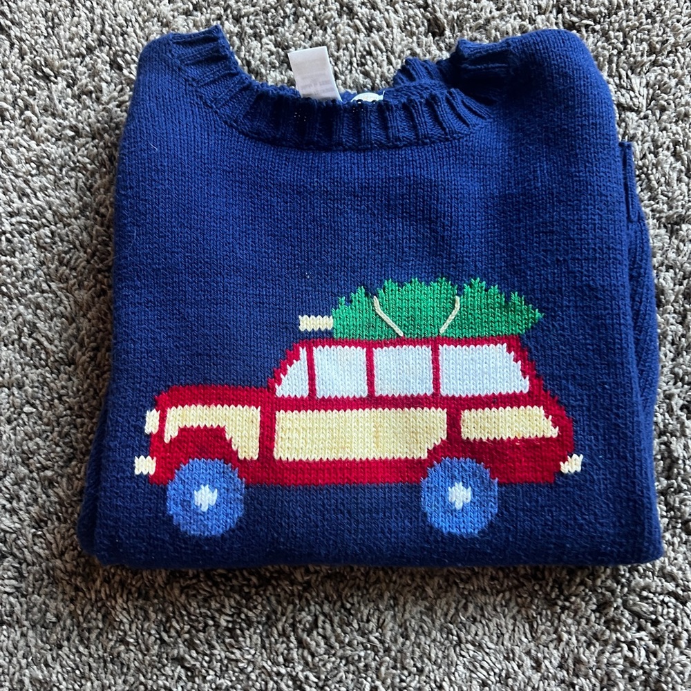 The Beaufort bonnet, blue holiday sweater, size 7